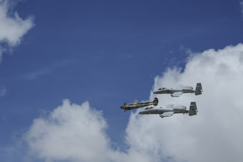 Two U.S. Air Force A-10C Thunderbolt IIs, assigned to the 354th Fighter Squadron and a part of the A-10 West Heritage Flight Team, and a P-38 Lightning fly in formation during the Los Angeles County Air Show in Lancaster, Calif., March 25, 2017. This is the team’s first air show performance after nearly five years of disbandment. (U.S. Air Force photo by Airman 1st Class Mya M. Crosby)