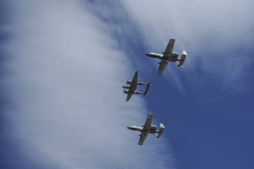 Two U.S. Air Force A-10C Thunderbolt IIs, assigned to the 354th Fighter Squadron and a part of the A-10 West Heritage Flight Team, and a P-38 Lightning fly in formation during the Los Angeles County Air Show in Lancaster, Calif., March 26, 2017. This is the team’s first air show performance after nearly five years of disbandment. (U.S. Air Force photo by Airman 1st Class Mya M. Crosby)