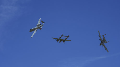Two U.S. Air Force A-10C Thunderbolt IIs, assigned to the 354th Fighter Squadron and a part of the A-10 West Heritage Flight Team, and a P-38 Lightning break away after flying in formation during the Los Angeles County Air Show in Lancaster, Calif., March 26, 2017. The A-10 WHFT is scheduled to perform in 9 more air shows throughout the U.S. this year after resurging from a 5-year-long inactivation period. (U.S. Air Force photo by Airman 1st Class Mya M. Crosby)