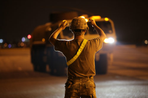 A U.S. Soldier directs a fuel truck during port operations in support of Balikatan 2017 at Subic Bay, Zambales, April 30, 2017. Balikatan is an annual U.S.-Philippine bilateral military exercise focused on a variety of missions, including humanitarian assistance and disaster relief, counterterrorism and other combined military operations.(U.S. Army photo by Spc. Mitchell Knaus)
