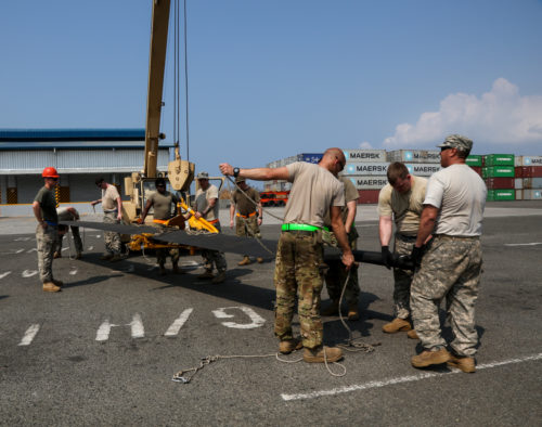 U.S. Soldiers with the 25th Combat Aviation Brigade, 25th Infantry Division, prepare a rotor to place on a CH-47 Chinook helicopter during port operations in support of Balikatan 2017 at Subic Bay, Zambales, May 2, 2017. Balikatan is an annual U.S.-Philippine bilateral military exercise focused on a variety of missions, including humanitarian assistance and disaster relief, counterterrorism, and other combined military operations.  (U.S. Army photo by Staff Sgt. Nashaunda Tilghman)