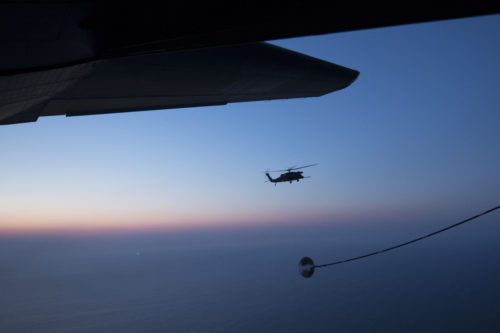 A Japan Air Self-Defense Force UH-60J Black Hawk helicopter assigned to the Hamamatsu Air Rescue Squadron approaches a U.S. Air Force MC-130H Combat Talon II assigned to the 353rd Special Operations Group during helicopter air-to-air refueling training over the Pacific Ocean, June 15, 2017. The 353rd SOG conducted a 10-day long joint combined exchange training exercise with JASDF rescue squadrons. (U.S. Air Force photo by Yasuo Osakabe)