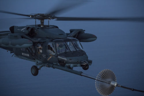 A Japan Air Self-Defense Force UH-60J Black Hawk assigned to the Hamamatsu Air Rescue Squadron executes a helicopter air-to-air refueling over the Pacific Ocean, June 15, 2017, during Exercise Teak Jet. This is the first time that members of the 353rd Special Operations Group held HAAR training at night with JASDF members in Honshu Island in Japan.  (U.S. Air Force photo by Yasuo Osakabe)