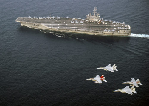 170601-N-EM227-117  SEA OF JAPAN (June 1, 2017) U.S. Navy and Japan Air Self-Defense Force aircraft fly in formation over the Nimitz-class aircraft carrier USS Ronald Reagan (CVN 76). The U.S. Navy and Japan Air Self-Defense Force routinely fly together to continue efforts of supporting security and stability in the Indo-Asia-Pacific region. (U.S. Navy photo by Lt. j.g. Artur Sedrakyar/Released)