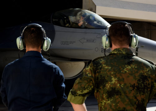 U.S. Air Force Airman 1st Class Noah Luis Rivera, left, 31st Aircraft Maintenance Squadron crew chief, shows a German air force crew chief, right, how he prepares a F-16C Fighting Falcon assigned to the 510th Fighter Squadron, Aviano Air Base, Italy, for a day of flying during Blue Flag 17 at Uvda Air Force Base, Israel, Nov. 7. This biennial exercise, hosted by Israel, is designed to further improve interoperability and strengthen relationships. (U.S. Air Force photo/Senior Airman Abby L. Finkel)