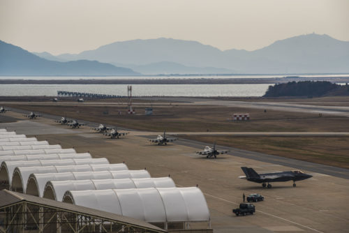 U.S. Air Force F-16 Fighting Falcons assigned to the 8th Fighter Wing taxi in front of an F-35A Lightning II assigned to Hill Air Force Base, Utah at Kunsan Air Base, Republic of Korea, Dec. 3, 2017. The 8th Fighter Wing hosted the fifth-generation fighters to train side-by-side during the week-long, bi-annual exercise VIGILANT ACE 18. (U.S. Air Force photo by Master Sgt. Frank W. Miller III)