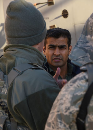 An Indian Air Force crewmember talks with a 319th Security Forces Squadron Airman on the flight line Jan. 13, 2018, at Grand Forks Air Force Base, N.D. (U.S. Air Force photo by Airman 1st Class Elora J. Martinez)
