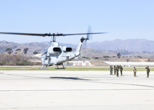 One after another, Marines from Marine Light Attack Helicopter Training Squadron (HMLAT) 303, Marine Aircraft Group (MAG) 39, lined up on the flight line at Marine Corps Air Station Camp Pendleton, Calif., to send off the last 3rd Marine Aircraft Wing (MAW) AH-1W “Super Cobra” as it departed on its final flight, Feb. 6, to Davis-Monthan Air Force Base’s Aerospace Maintenance and Regeneration Group (AMARG) in Arizona. The AH-1W Super Cobra has been transitioned to the AH-1Z Viper. (U.S. Marine Corps Photo by Pfc. Juan Anaya Jr./ Released)