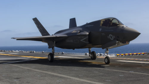An F-35B from Marine Fighter Attack Squadron-211, 13th Marine Expeditionary Unit (MEU), prepares to take off for flight operations aboard the Wasp-class Amphibious ship USS Essex (LHD 2) March 28, 2018. The Essex Amphibious Ready Group and 13th MEU fully integrated for the first time before their summer deployment. Amphibious Squadron, MEU integration training is a crucial pre-deployment exercise that allows the Navy-Marine Corps team to rapidly plan and execute complex operations from naval shipping. (U.S. Marine Corps photo by Cpl. A. J. Van Fredenberg)