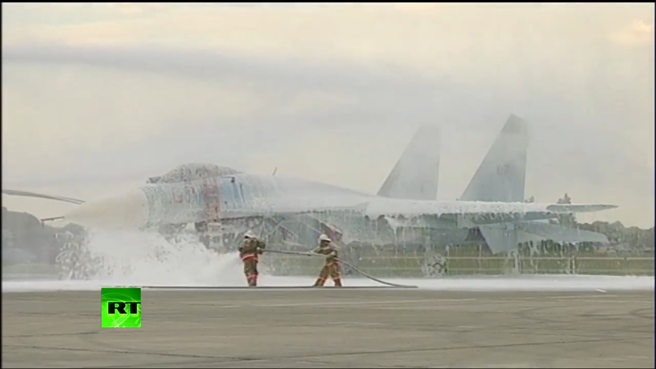 Watch Russian firefighters douse a Su-27 with foam