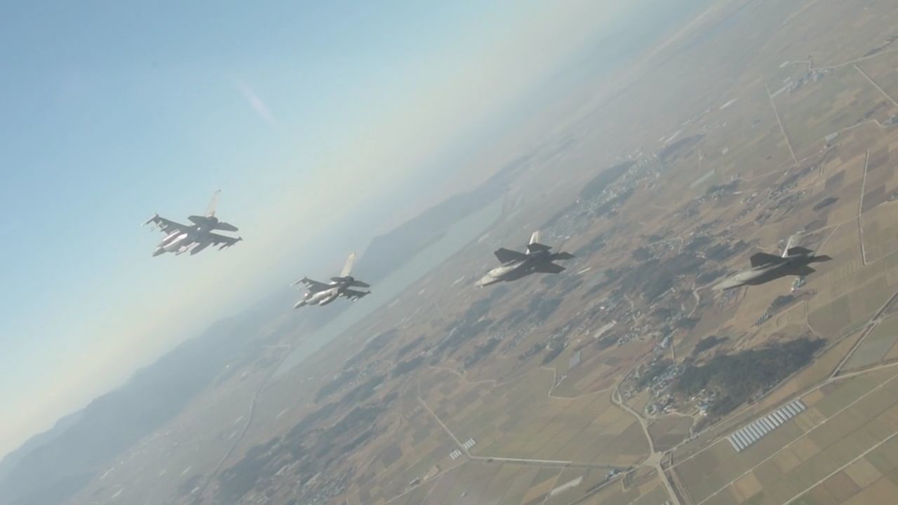 B-roll of Kunsan F-16s, Hill F-35s over South Korea
