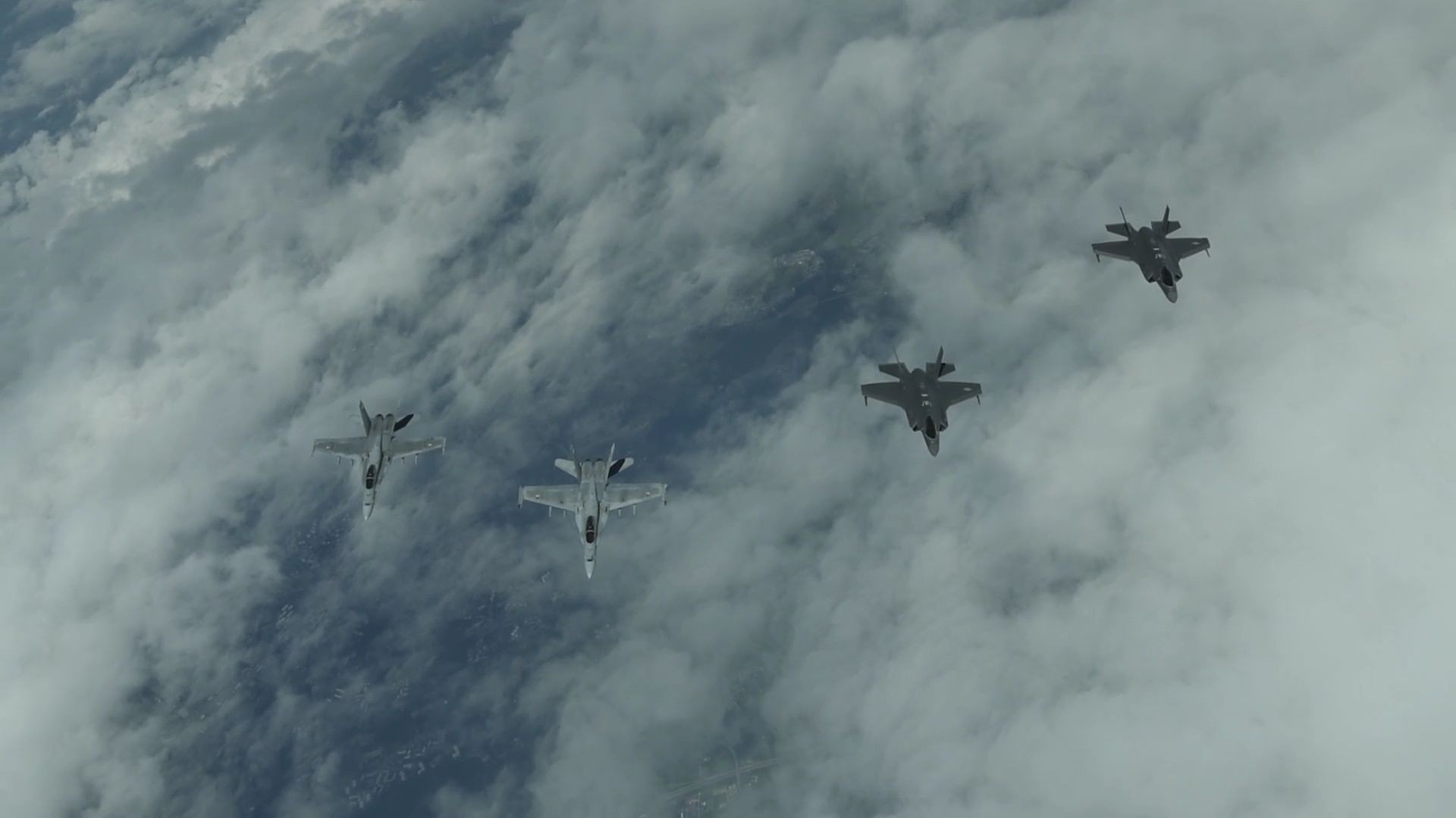 Watch USAF F-35As and Finnish F-18s fly together